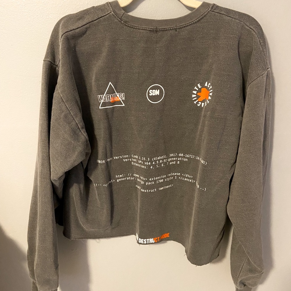 Cropped graphic crew neck sweatshirt